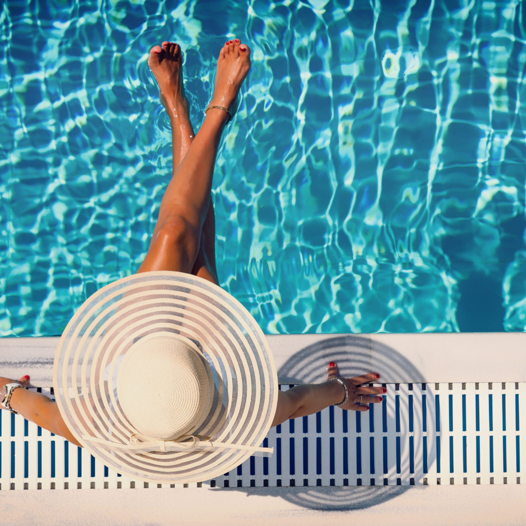 Woman Sitting by Pool